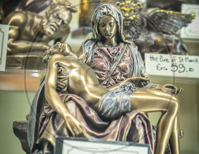 Venice, Italy - 30 June 2018: Pieta Artifacts On Display In A Shop In Venice, Italy