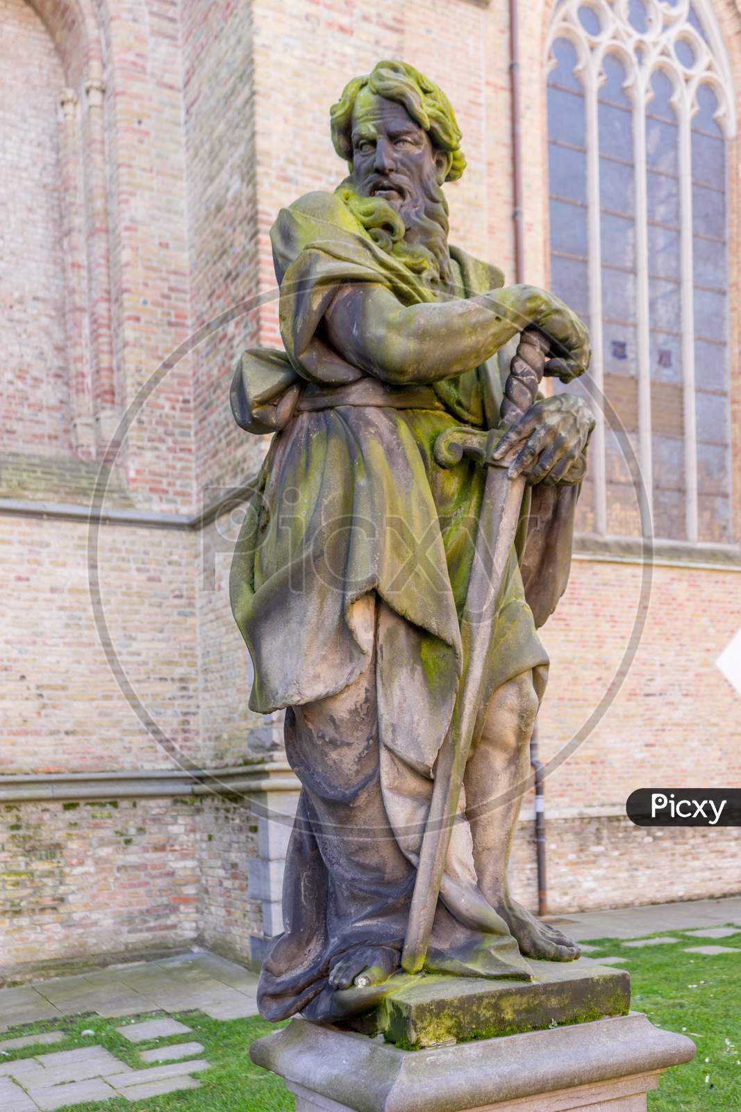 Bruges, Belgium - 17 February 2018: Statue In Front Of Church Of Our Lady In Bruges, Belgium