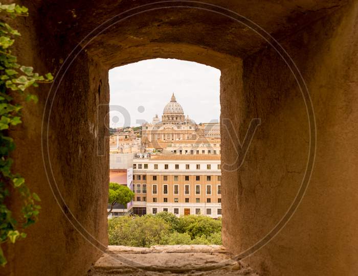 Rome, Italy - 23 June 2018: Saint Peter'S Church Viewed Through A Square Hole In Wall In Rome, Italy