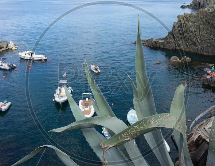 Riomaggiore, Cinque Terre, Italy - 26 June 2018: Boats Docked At The Cove Of Riomaggiore, Cinque Terre, Italy