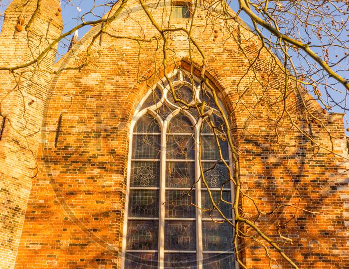 Belgium, Bruges,  Arch Glass Window