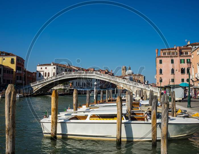 Venice, Italy - 30 June 2018: People Walking On The Bridge Over The Grand Canal In Venice, Italy