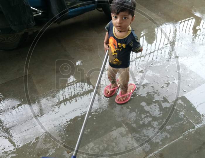 Child Playing Water