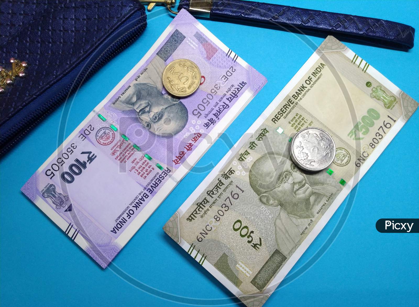 Indian Currency ,100,20 Rupee Notes With Purse ,Blue Background