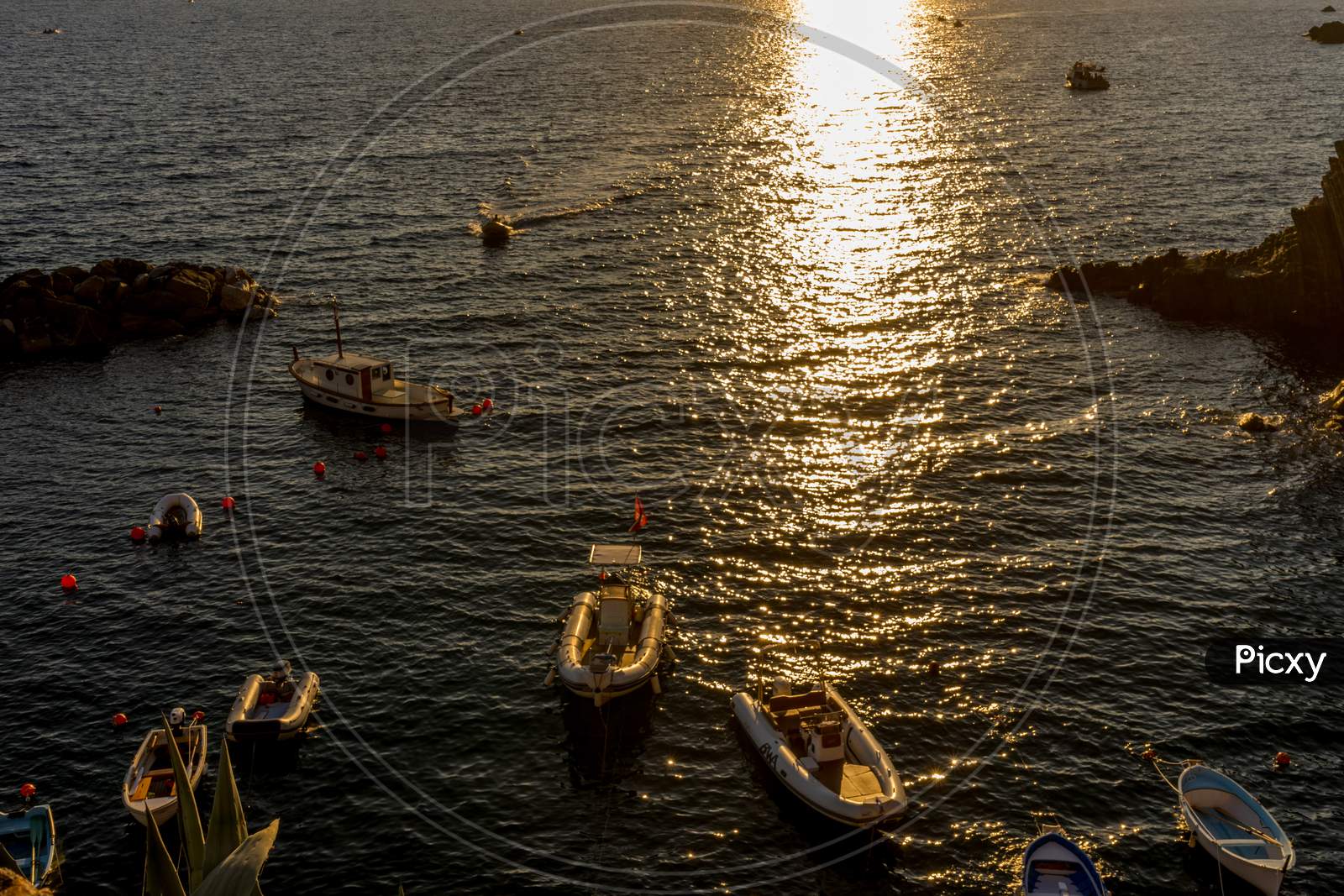 Riomaggiore, Cinque Terre, Italy - 26 June 2018: Boats And Yachts On The Ocean During Sunset, Italian Riviera Of Riomaggiore, Cinque Terre, Italy