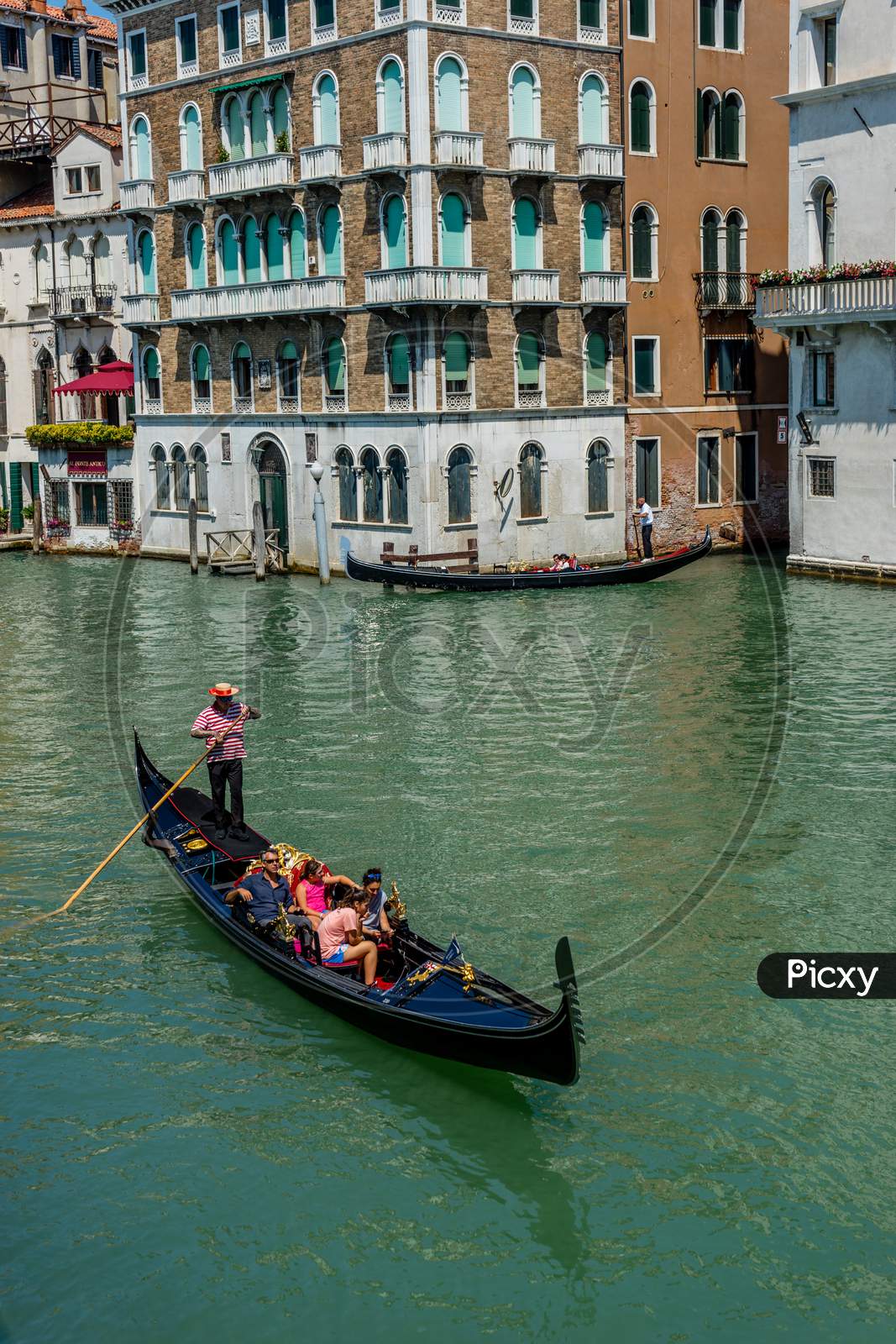Venice, Italy - 01 July 2018: The Gondolas On A Grand Canal In Venice, Italy