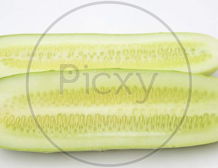 Sliced Cucumber Isolated On White Background.