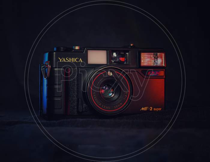 Product photography of vintage yashica camera.