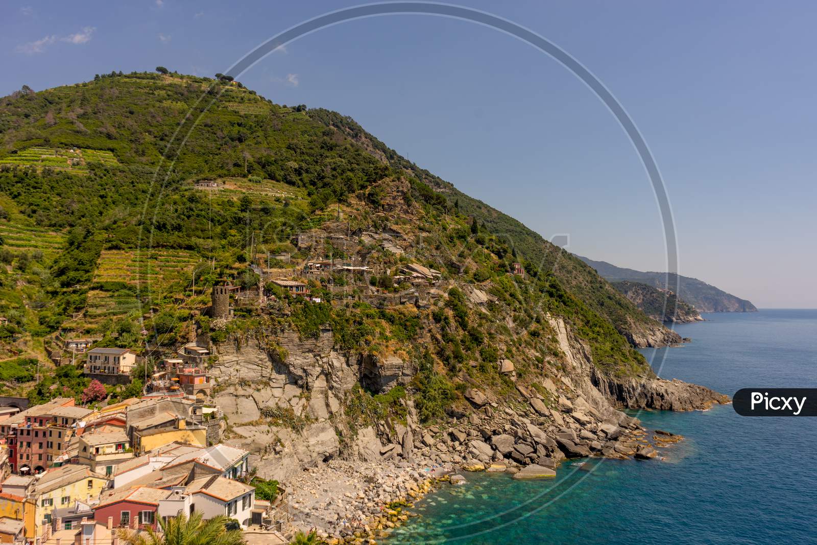 Italy, Cinque Terre, Vernazza, Vernazza, Scenic View Of Sea And Mountains Against Clear Sky