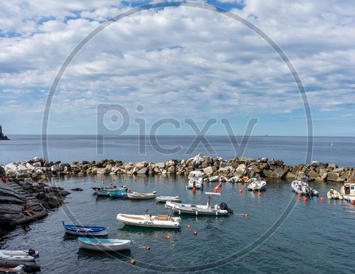 Riomaggiore, Cinque Terre, Italy - 26 June 2018: Boat Docked At The Cove Of Riomaggiore, Cinque Terre, Italy