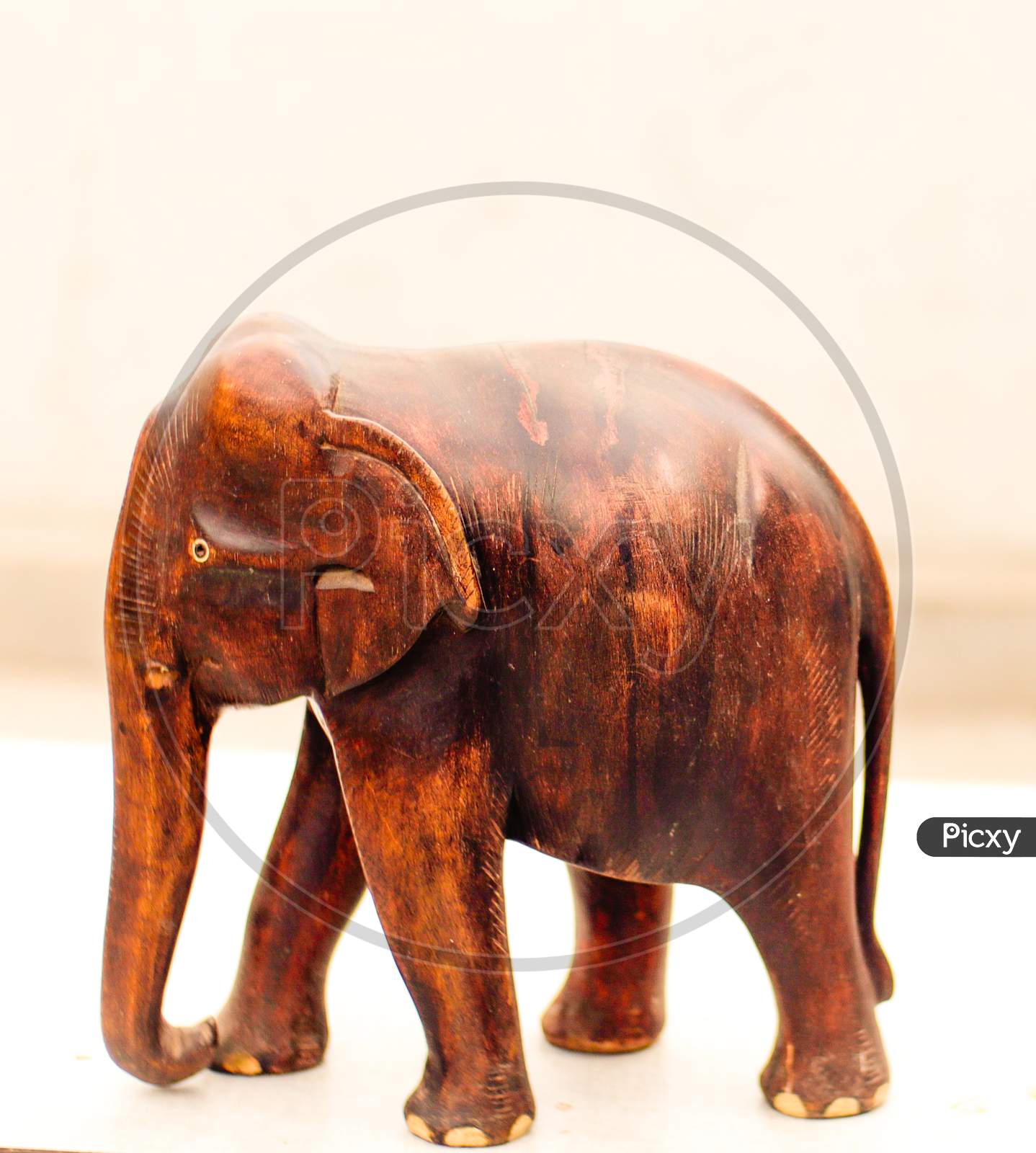 A typical Kerala style wood art sculpture of Indian Elephant.