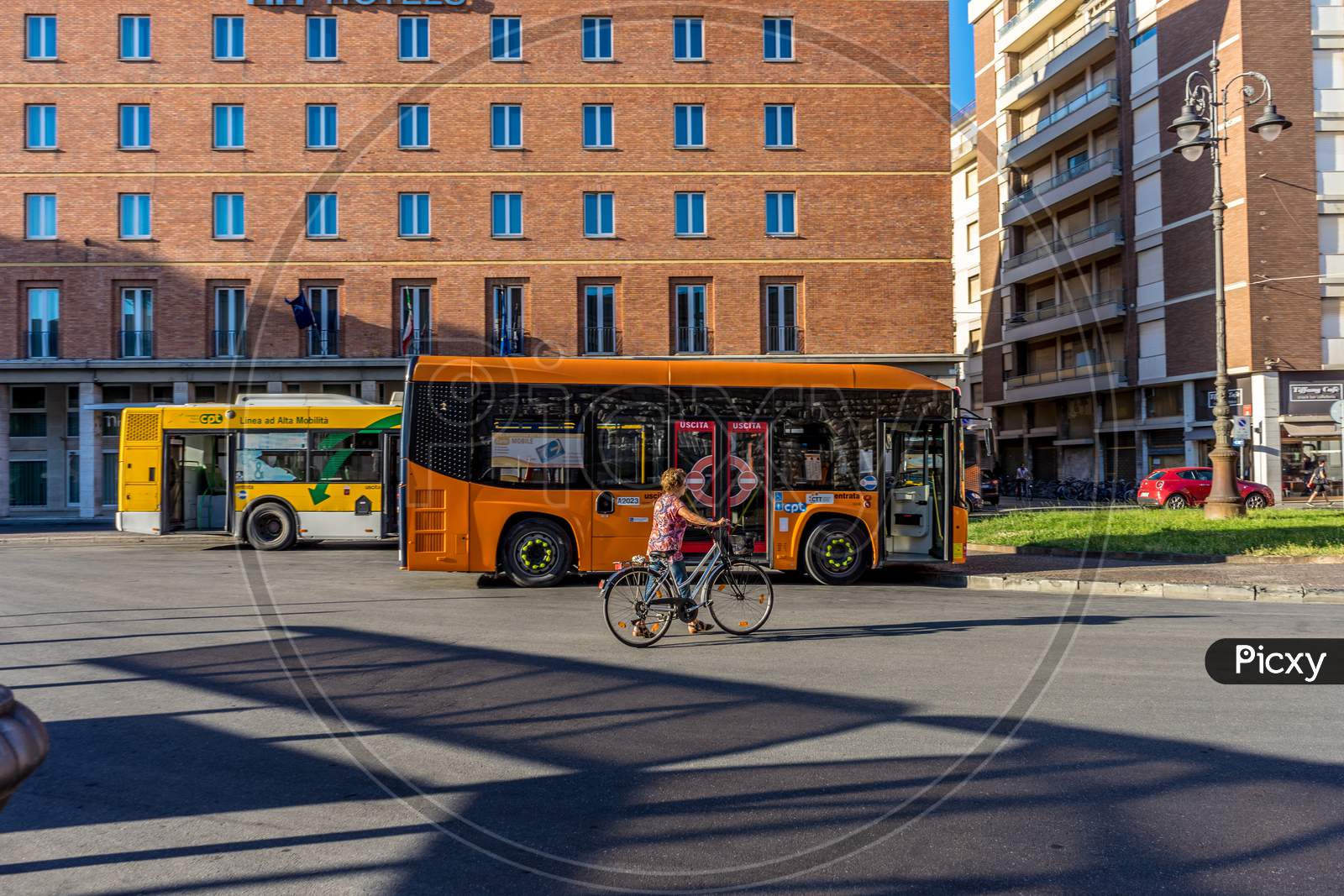 Pisa, Italy - 25 June 2018: Orange Local Transport Bus In Pisa, Italy