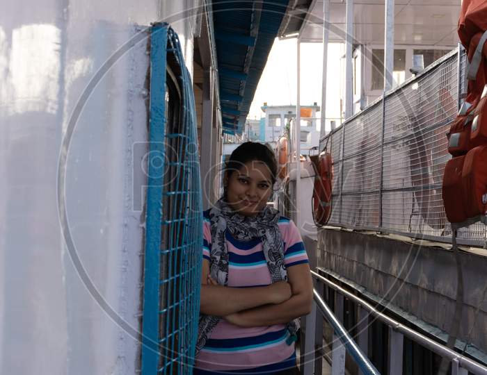 Girl Posing At Ship Deck At Evening