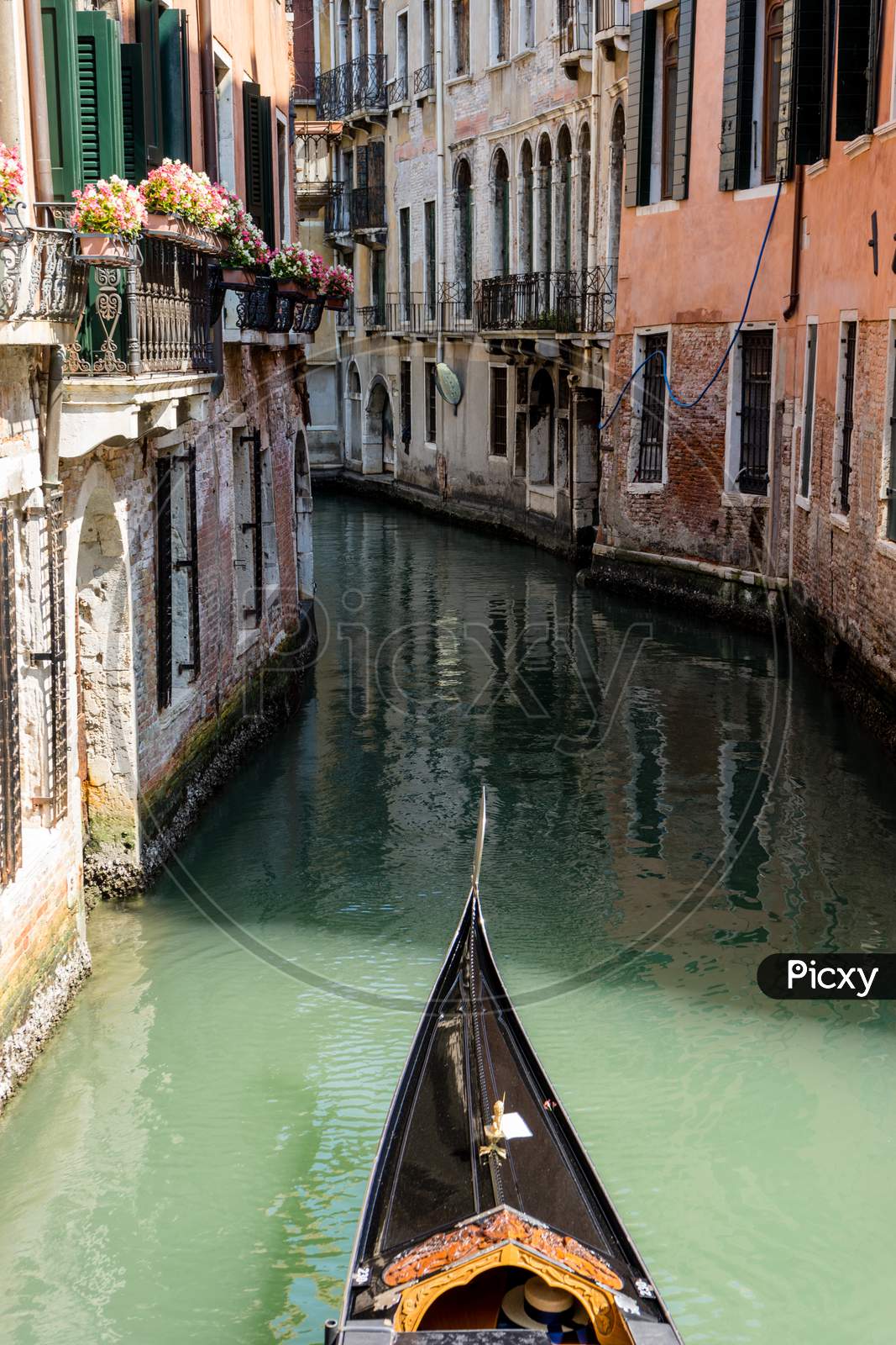 Italy, Venice, Gondola Navigating The Narrow Canals