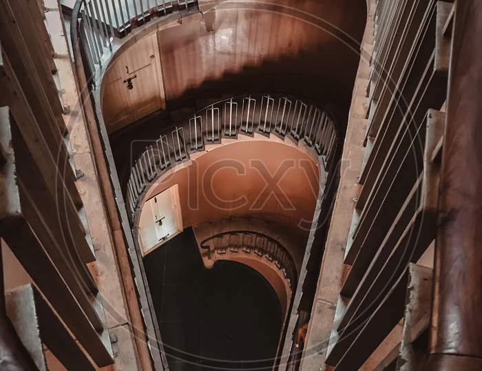 A top down view of stairs with symmetrical beauty.