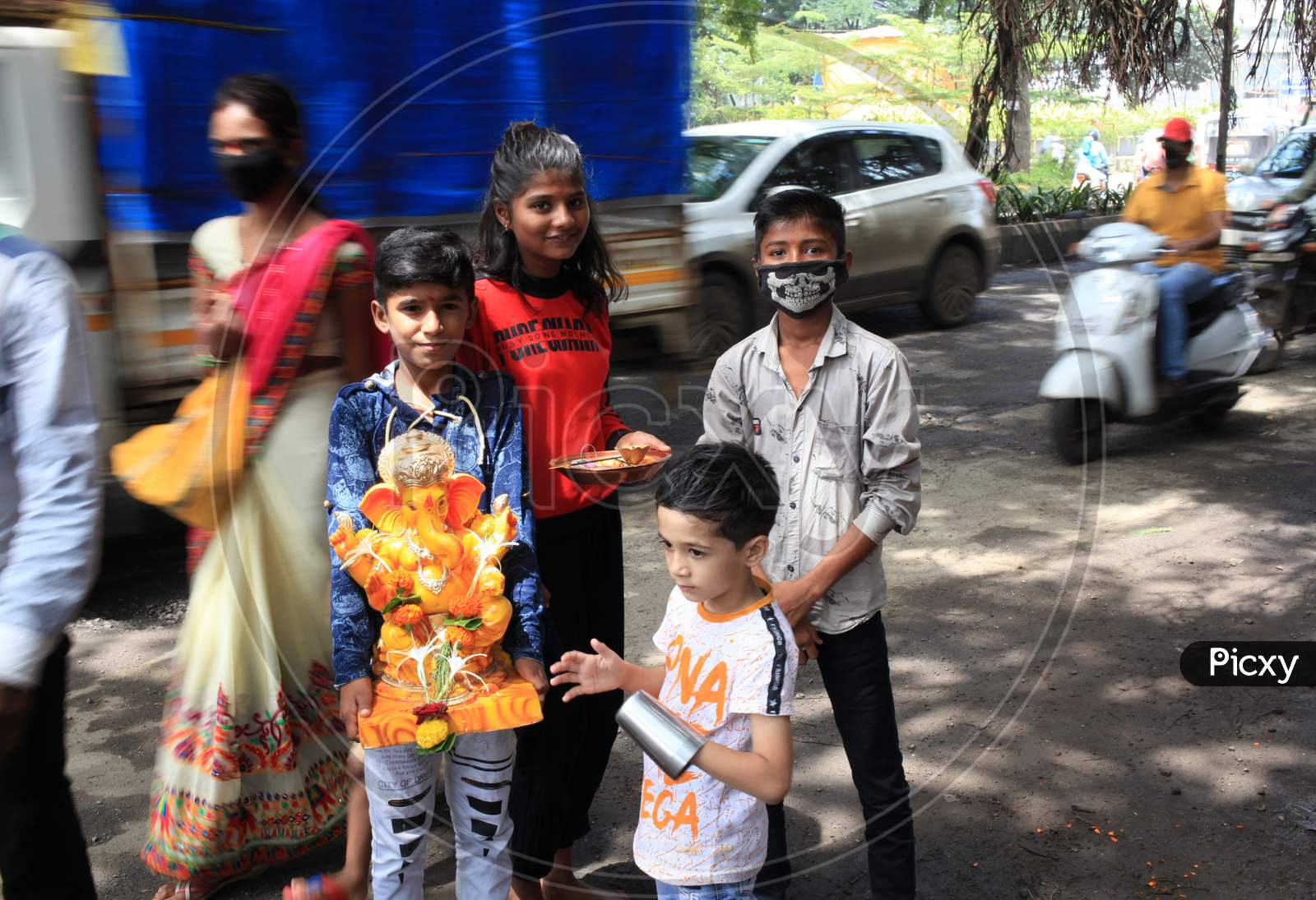 A Gang Of Children Taking Lord Ganesha To The Local Designated Tank For The Annual Immersion Ritual. This Marks The End To The 10 Day Ganpati Festival.