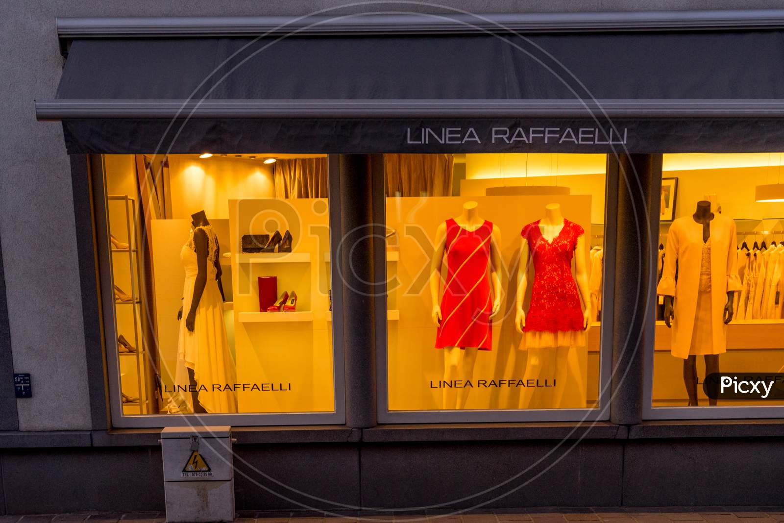Bruges, Belgium - 17 February 2018: Mannequin With Red Dress At Linea Raffaelli Shop At Bruges, Belgium