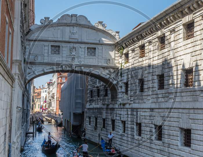 Italy, Venice, Bridge Of Sighs, A Group Of People On Bridge Of Sighs Over Water