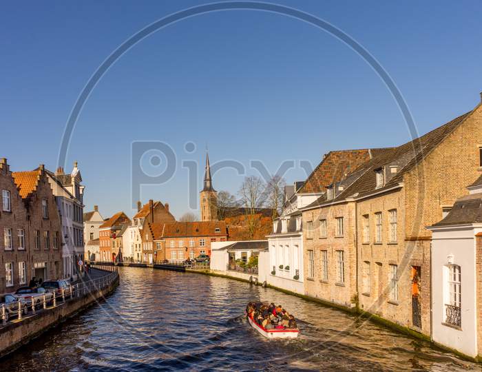 Belgium, Bruges, Flanders Tourist Boar On The Canal In Bruges,