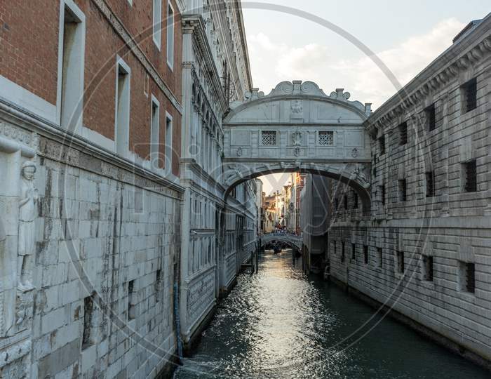 Italy, Venice, Bridge Of Sighs, Water Next To The Building With Bridge Of Sighs In The Background