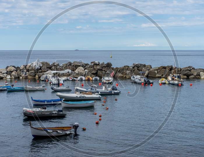 Riomaggiore, Cinque Terre, Italy - 26 June 2018: Boat Docked At The Cove Of Riomaggiore, Cinque Terre, Italy