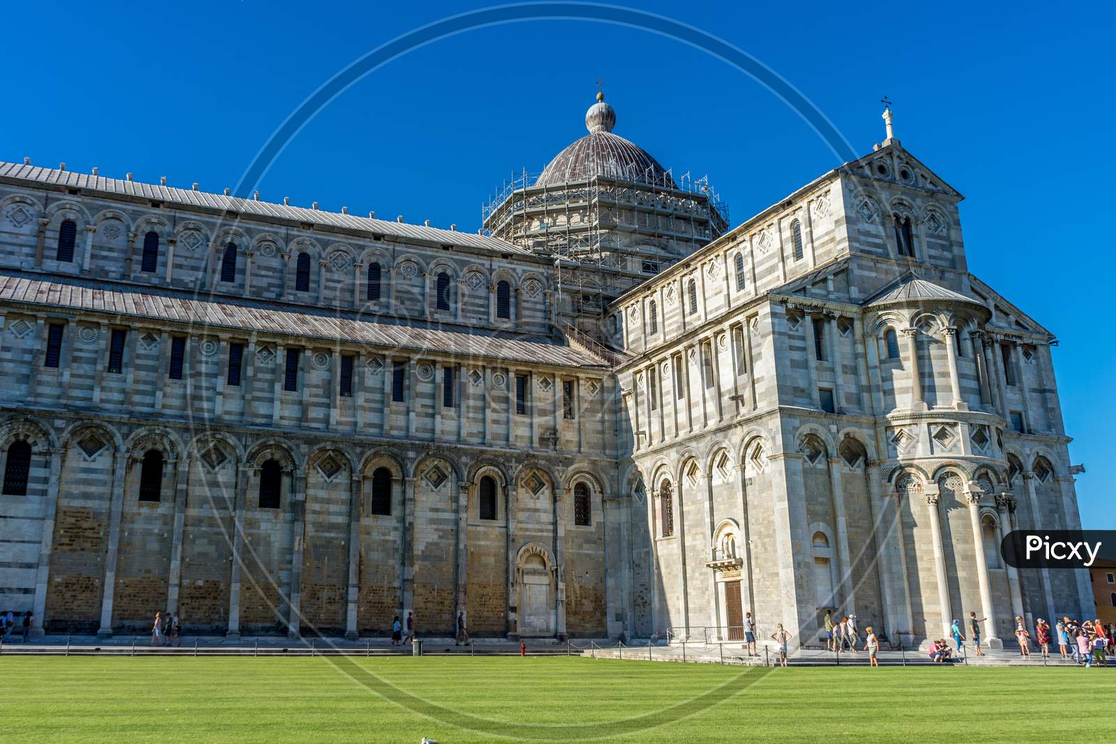 Pisa, Italy - 25 June 2018: The Leaning Tower Of Pisa At Piazza Del Miracoli Duomo Square,Camposanto Cemetery In Tuscany, Italy