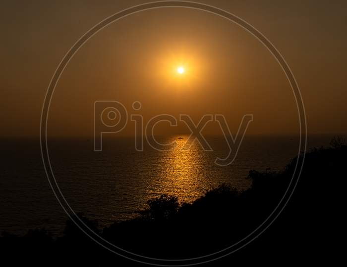 sunset at beach of goa,india