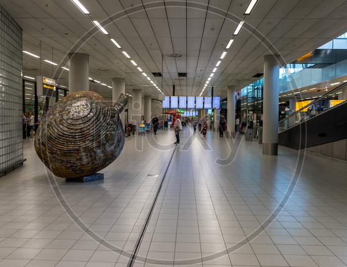 Netherlands, Amsterdam, Schiphol - 06 May, 2018:  Security Personnel Walking At The Airport