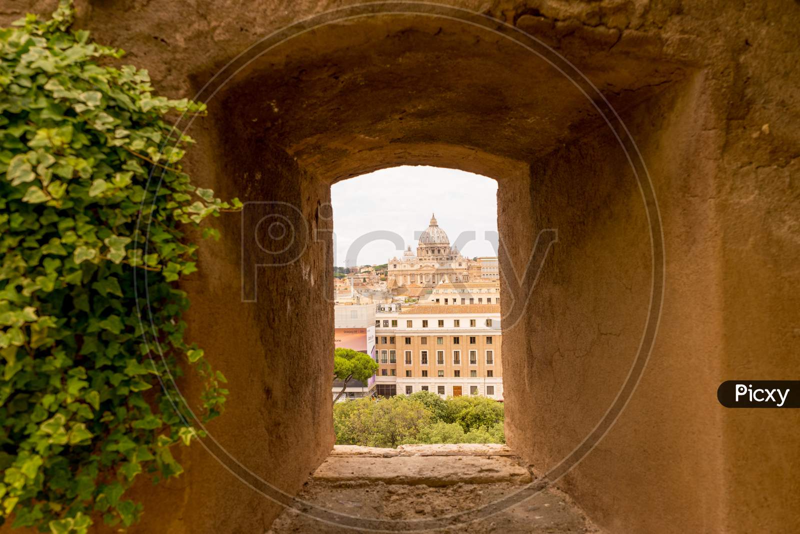Rome, Italy - 23 June 2018: Saint Peter'S Church Viewed Through A Square Hole In Wall In Rome, Italy