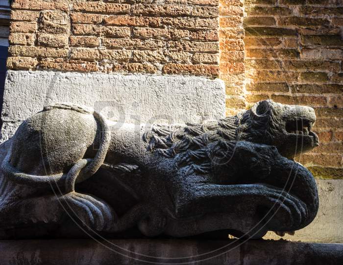 Italy, Venice, Close-Up Of Old Sculpture Against Wall