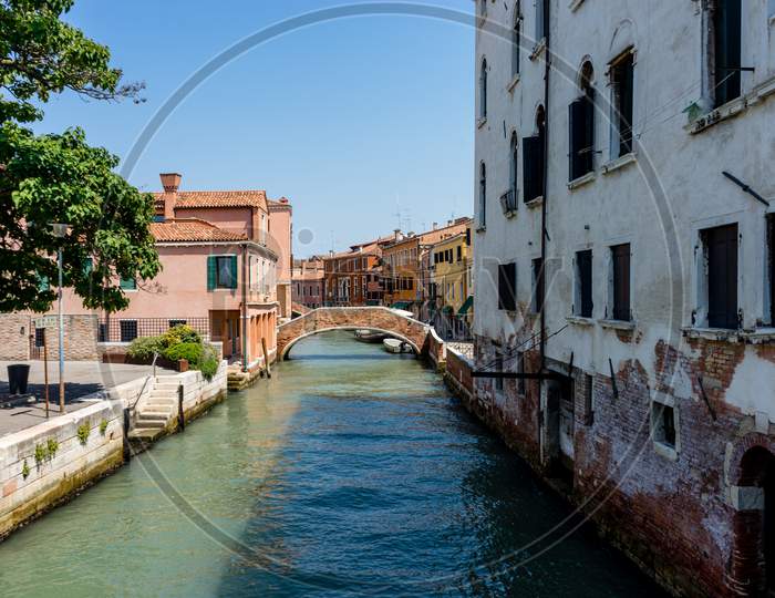 Italy, Venice, A Bridge Over A Body Of Water