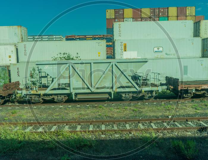 Italy - 28 June 2018: The K Line, Maersk, Cma Cgm, Cai, Arkas,Triton, Sav,Evergreen Container On A Train In Italy