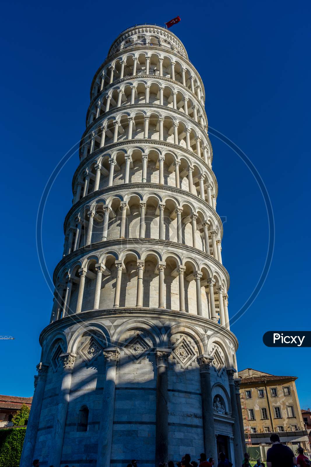 Pisa, Italy - 25 June 2018: Tourists At The Leaning Tower Of Pisa In Tuscany, Italy