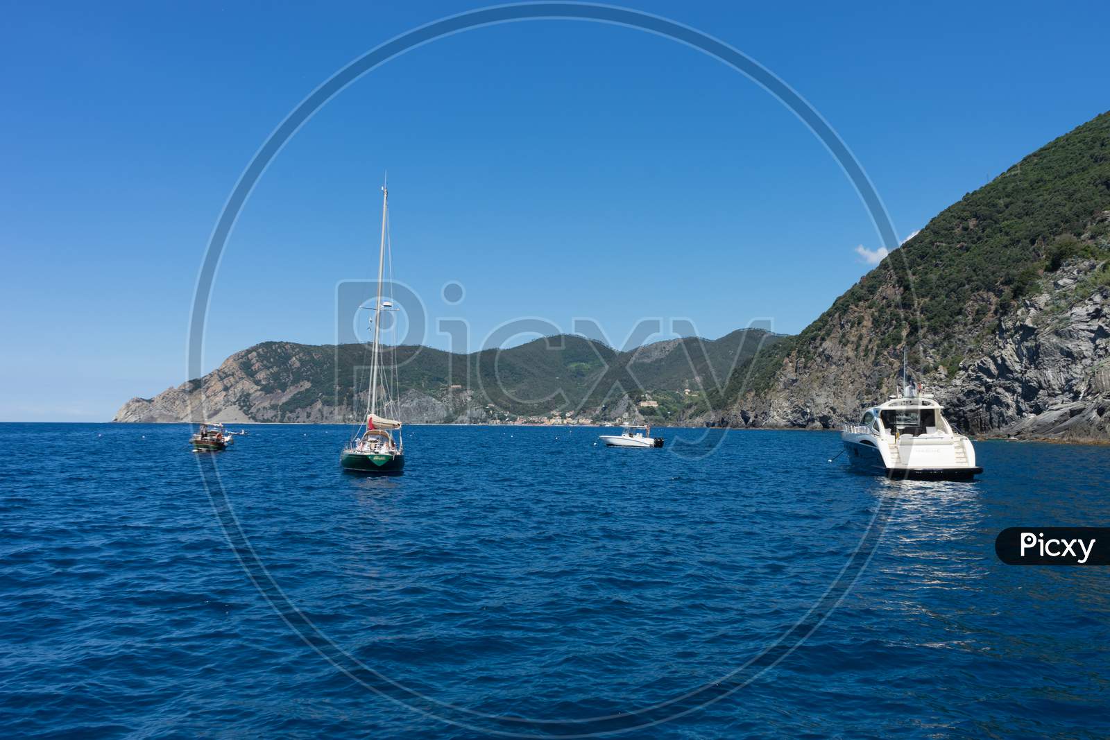 Riomaggiore, Cinque Terre, Italy - 26 June 2018: Boats And Yachts On The Ocean, Italian Riviera Of Riomaggiore, Cinque Terre, Italy