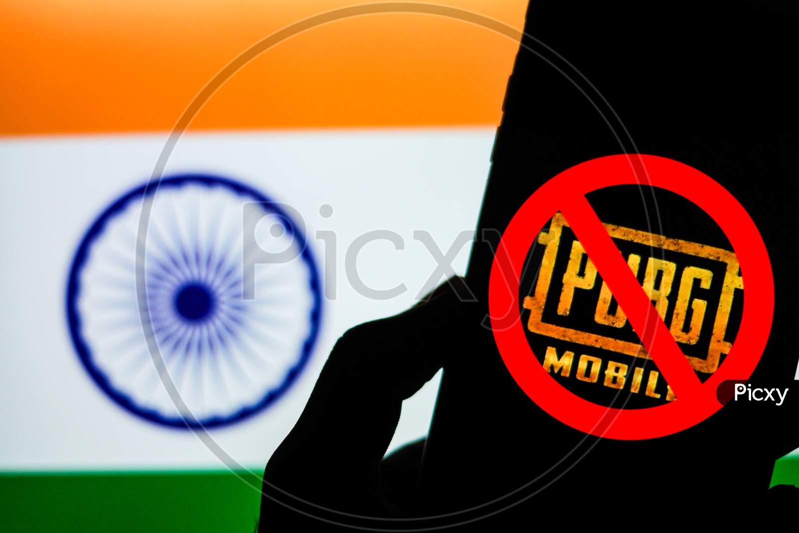Banned PUBG or Playerunknown's Battlegrounds Game Logo on Smartphone Screen with Indian Flag in the Background