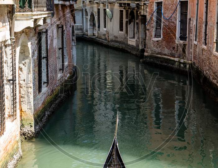 Italy, Venice, Gondola Navigating The Narrow Canals