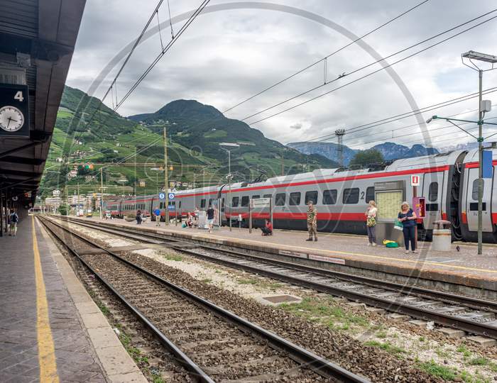 Bolzano, Italy - 28 June 2018: The Bolzano Railway Station With The Dolomites In The Background, Italy