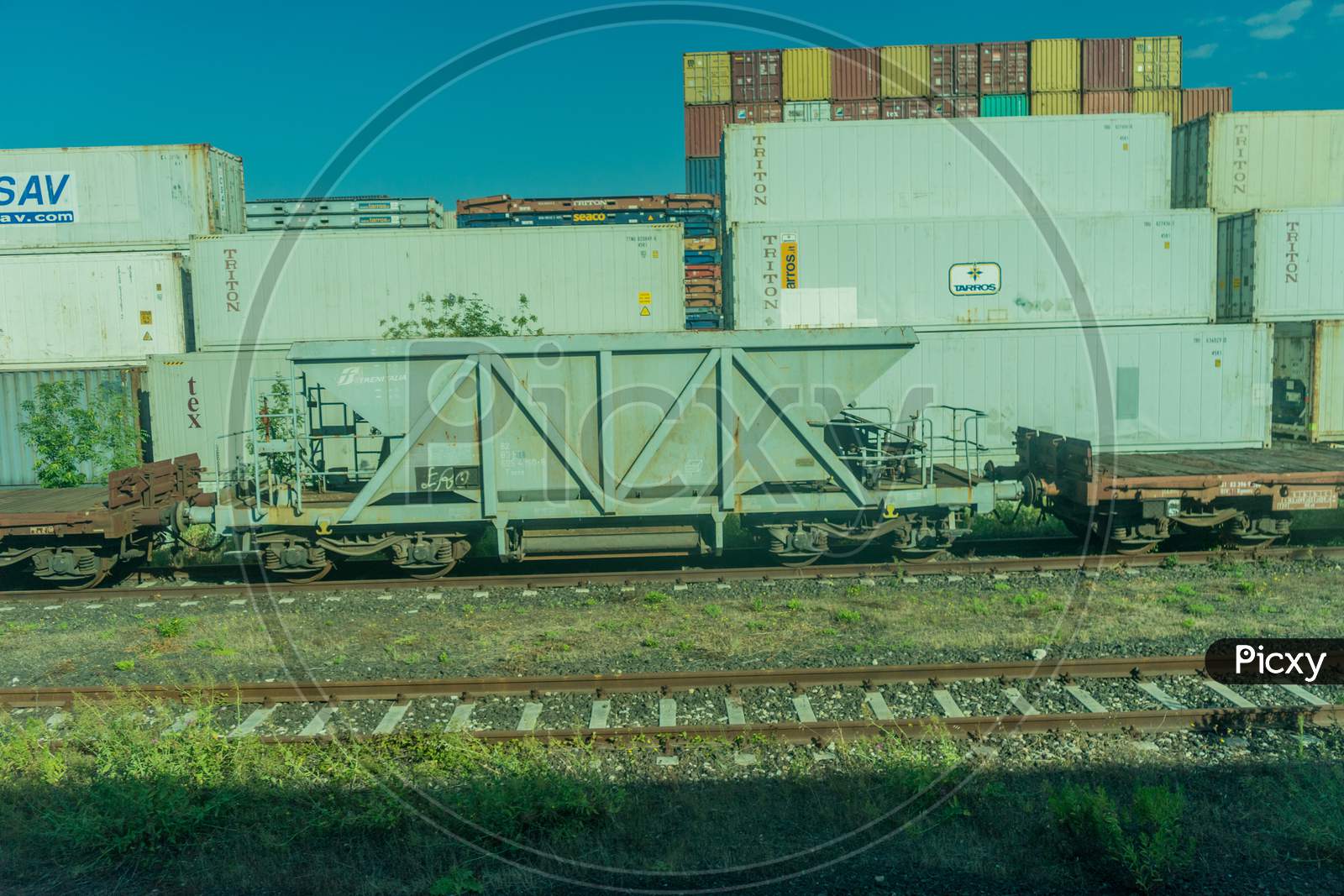 Italy - 28 June 2018: The K Line, Maersk, Cma Cgm, Cai, Arkas,Triton, Sav,Evergreen Container On A Train In Italy