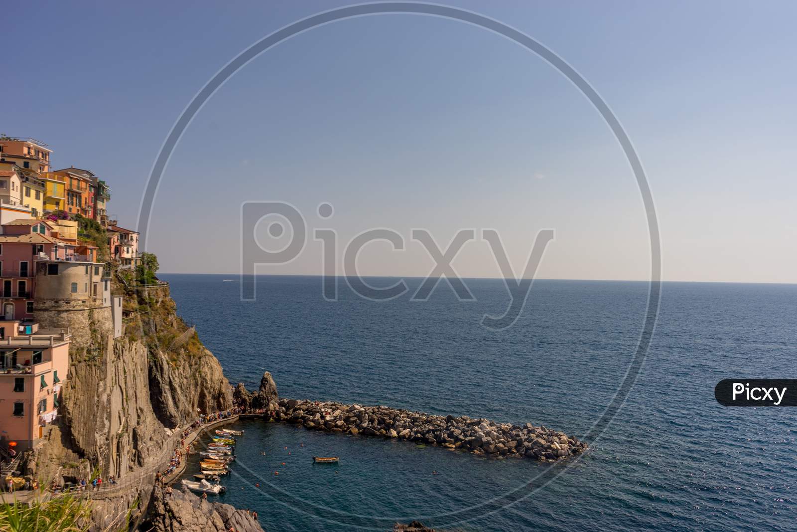 Italy, Cinque Terre, Manarola,Panoramic View Of Sea And Buildings Against Clear Sky