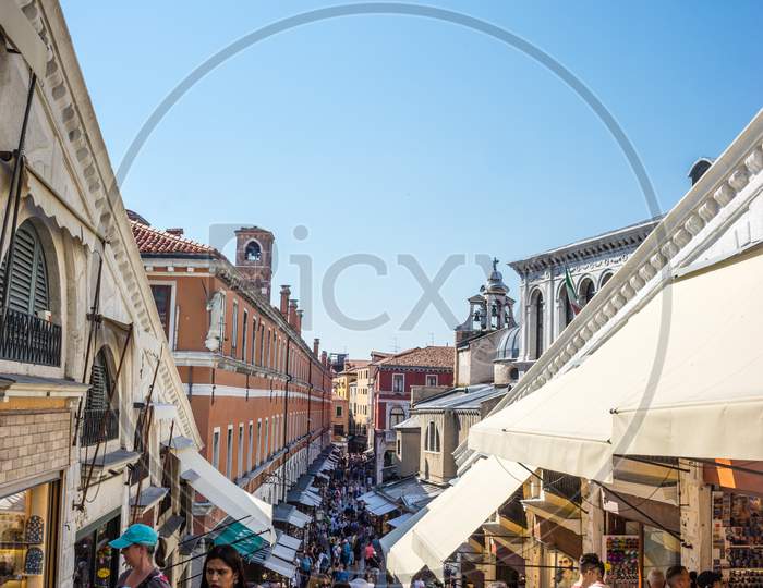 Venice, Italy - 30 June 2018: People Walkong Down The Narrow Streets Of Venice, Italy