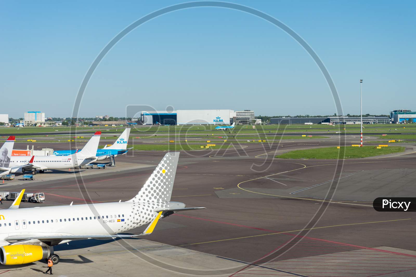 Netherlands, Amsterdam, Schiphol - 06 May, 2018: Vueling Planes At Airport. Schiphol Is One Of The Busiest Airport In Europe.