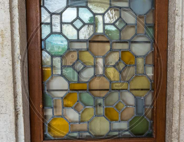 Door With A Glass Top With Colourful Patterns
