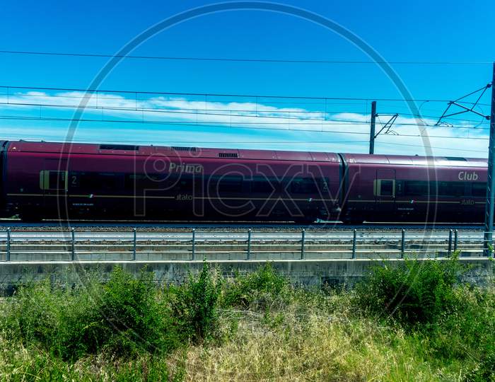 Italy - 28 June 2018: The Trenitalia Italo Prima Train In The Italian Outskirts Track