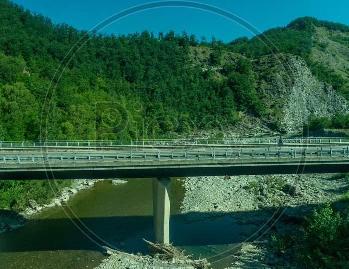 Italy,La Spezia To Kasltelruth Train, A Bridge Over A Body Of Water