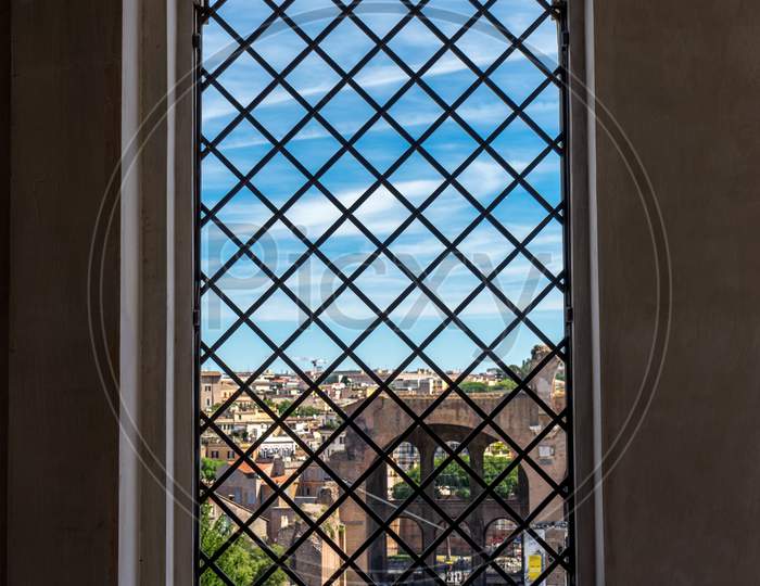 Italy, Rome Cityscape Viewed Through A Window