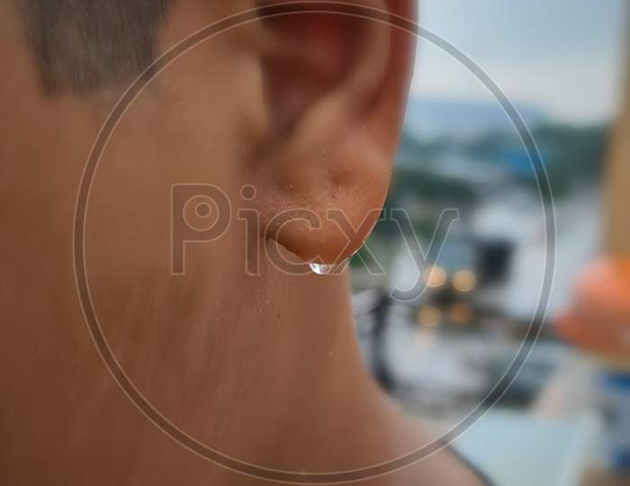 A human ear with water drop
