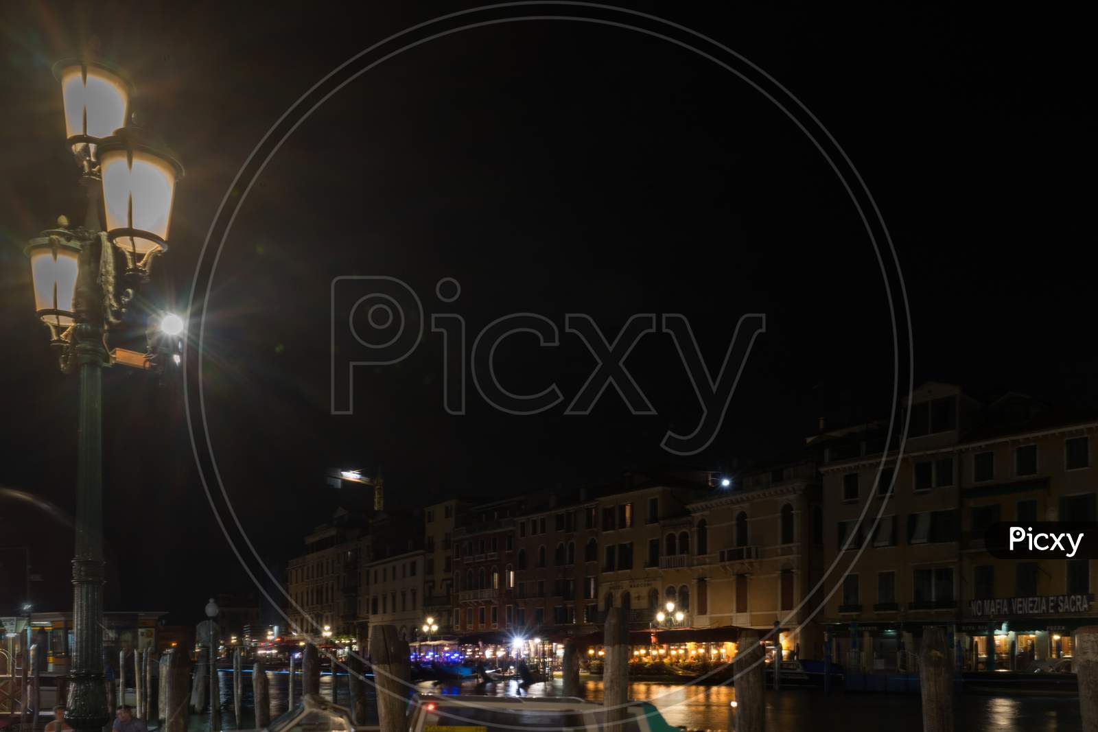Italy, Venice, A View Of A City At Night