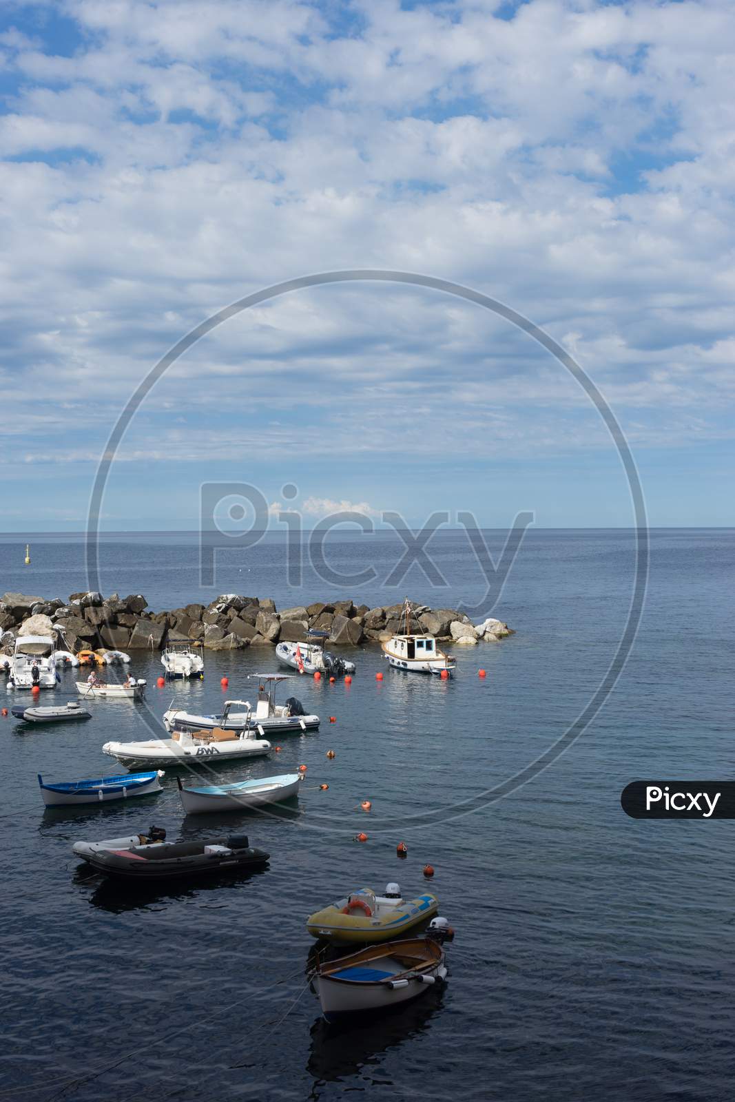 Riomaggiore, Cinque Terre, Italy - 26 June 2018: Boats Docked At The Cove Of Riomaggiore, Cinque Terre, Italy