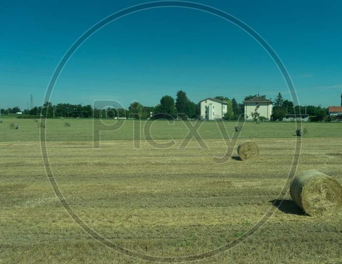 Italy,La Spezia To Kasltelruth Train, A Close Up Of A Dry Grass Field