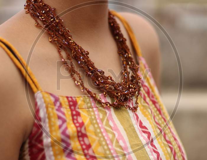 girl wearing handmade accessories